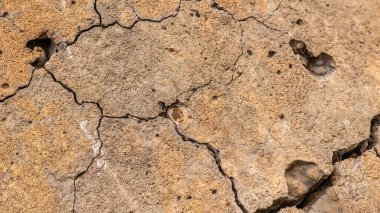 Çatlak beton dokusu yakın çekim. Soyut çimento arkaplanı