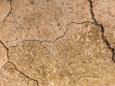 Çatlak beton dokusu yakın çekim. Soyut çimento arkaplanı