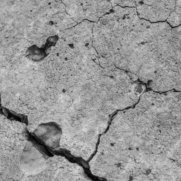 Abstrakter Betonhintergrund. Risse in der Betonstruktur Nahaufnahme. — Stockfoto