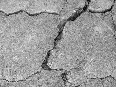 Soyut çimento arka planı. Çatlak beton dokusu yakın plan..