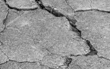 Soyut çimento arka planı. Çatlak beton dokusu yakın plan..