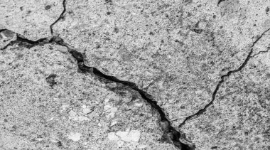 Soyut çimento arka planı. Çatlak beton dokusu yakın plan..