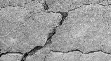 Soyut çimento arka planı. Çatlak beton dokusu yakın plan..