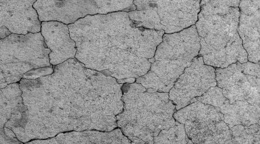 Soyut çimento arka planı. Çatlak beton dokusu yakın plan..