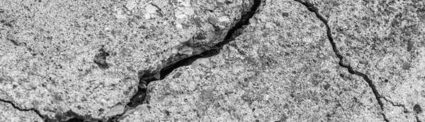 Abstracte cementachtergrond. Gebarsten betonnen textuur close-up. — Stockfoto