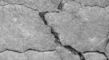 Soyut çimento arka planı. Çatlak beton dokusu yakın plan..