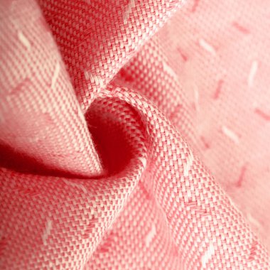 Doku, arka plan, şablon. Diğer pamuk kumaşları beyaz ve kırmızı, diğer pamuk kumaşları ipek. Yakın planda kumaş iplikleri ve doku desenleri görülebilir..