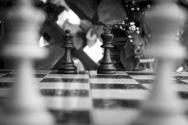 बुद्धिबळ एक बुद्धिबळ बोर्ड वर छायाचित्रे — स्टॉक फोटो, इमेज