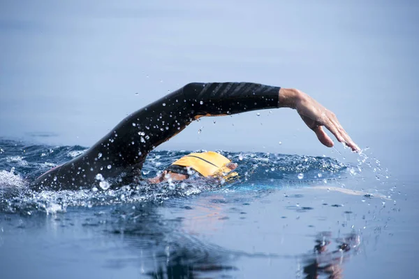 Unknown Swimmer at sea. — Stock Photo, Image