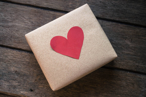 Gift box on wooden background