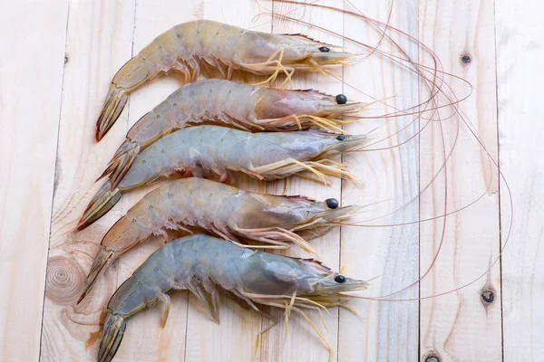 Fresh Whiteleg shrimp, pacific white shrimp on wooden — Stock Photo, Image