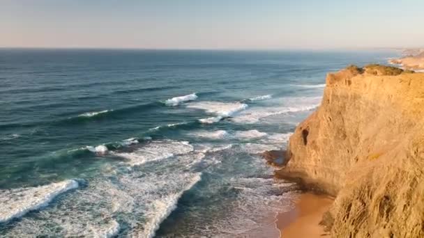 Aerial Drone Shot Waves Hitting Beach Cliffs Sunset Southern Portugal — Stock Video