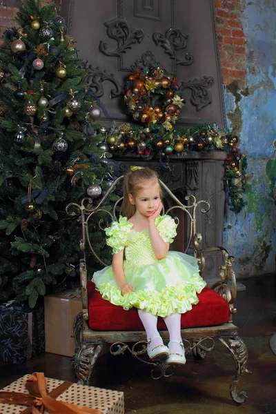 Little Girl Beautiful Yellow Dress Sits Chair Holding Her Face — Stock Photo, Image