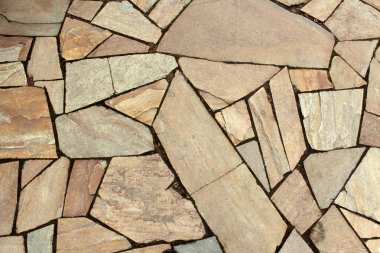 Taş zemin çok renkli granit mozaiklerden yapılmıştır. Arkaplan fotoğrafı sıcak renklerde