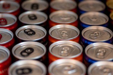 Assortment of softdrinks packed in a row