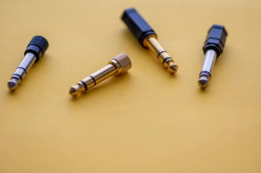 Assortment of audio jacks shot with selective focus