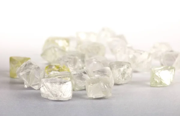 Assorted Rough Diamonds Grey Background — Stock Photo, Image