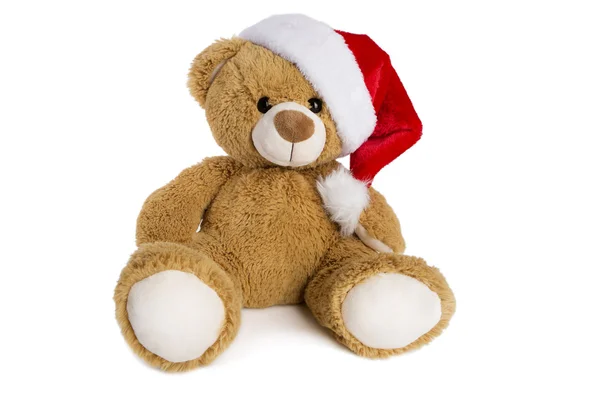 Teddy bear with Santa Claus hat isolated on white background — Stock Photo, Image