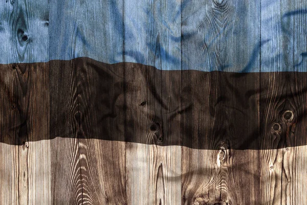 Bandera nacional de Estonia, fondo de madera —  Fotos de Stock