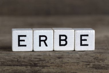 Almanca kelime miras, küpleri içinde yazılı