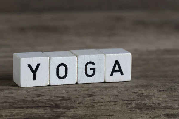 Yoga, written in cubes — Stock Photo, Image