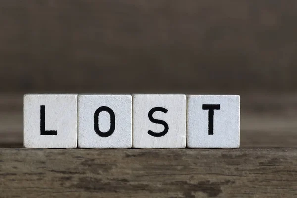 Perdido, escrito em cubos — Fotografia de Stock