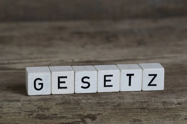 Almanca kelime hukuk, küpleri içinde yazılı — Stok fotoğraf