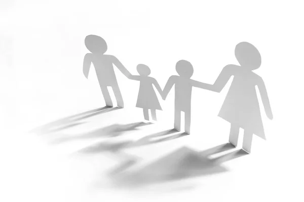 Family with two children, paper figures — Stock Photo, Image