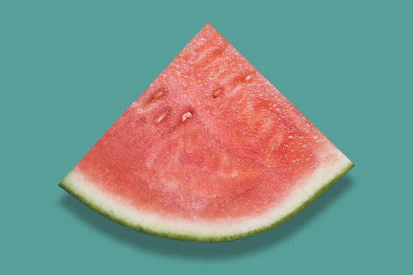 Piece of watermelon on green background — Stock Photo, Image