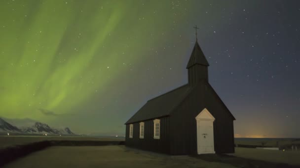Black church of Budir with northern lights in Iceland, cinemagraph Stock Footage