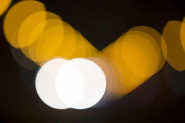 Barevné bokeh na černém pozadí — Stock fotografie