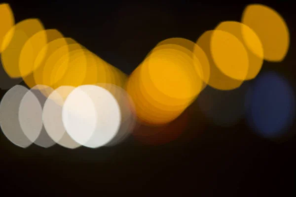 Colorful bokeh on black background — Stock Photo, Image