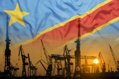Gün batımında Kongo bayrak ile endüstriyel kavramı