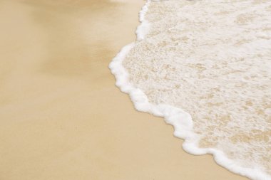 Tropikal plaj arka plan dalga yumuşak ve kum ile