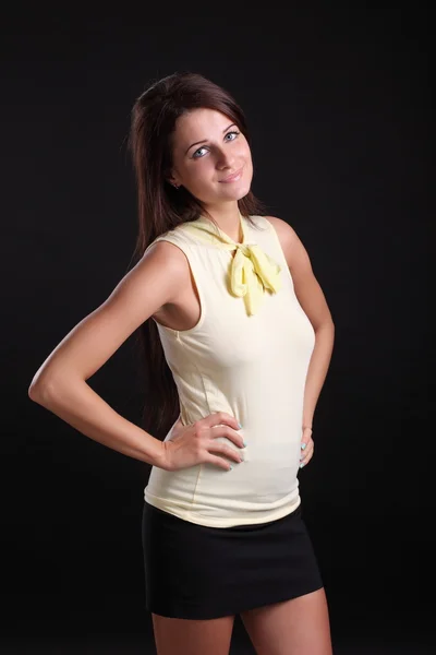 Beautiful  woman  in yellow blouse. — Stock Photo, Image