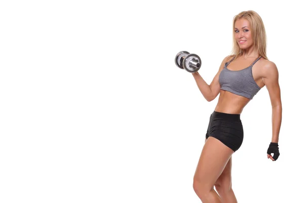 Woman lifting dumbbells — Stock Photo, Image