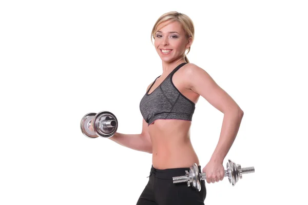 Hermosa mujer deportiva haciendo ejercicio con pesas — Foto de Stock