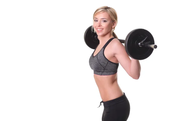 Fitness tjej liftings vikter — Stockfoto