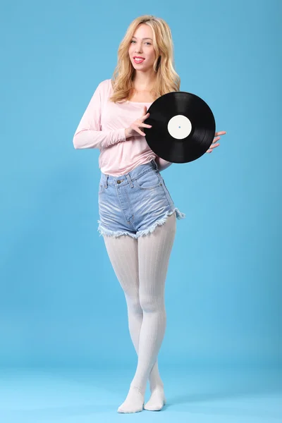 Young woman with old vinyl record — Stock Photo, Image