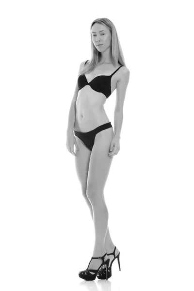Menina bonita em lingerie preta — Fotografia de Stock