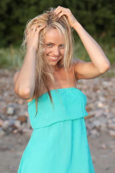 Young women in blue dress — Stock Photo, Image