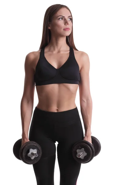 Deportivo musculoso mujer entrenamiento fuera con dumbbells —  Fotos de Stock