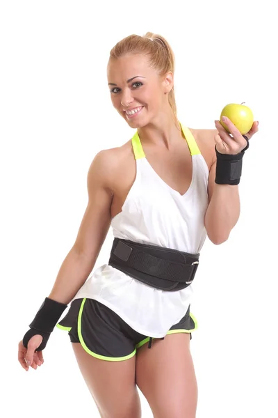 Jovem fitness mulher feliz sorrindo segurando maçã — Fotografia de Stock