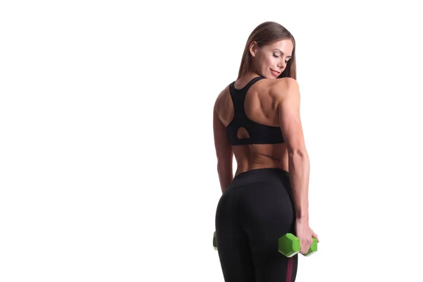 Sporty muscular woman working out with dumbbells — Stock Photo, Image