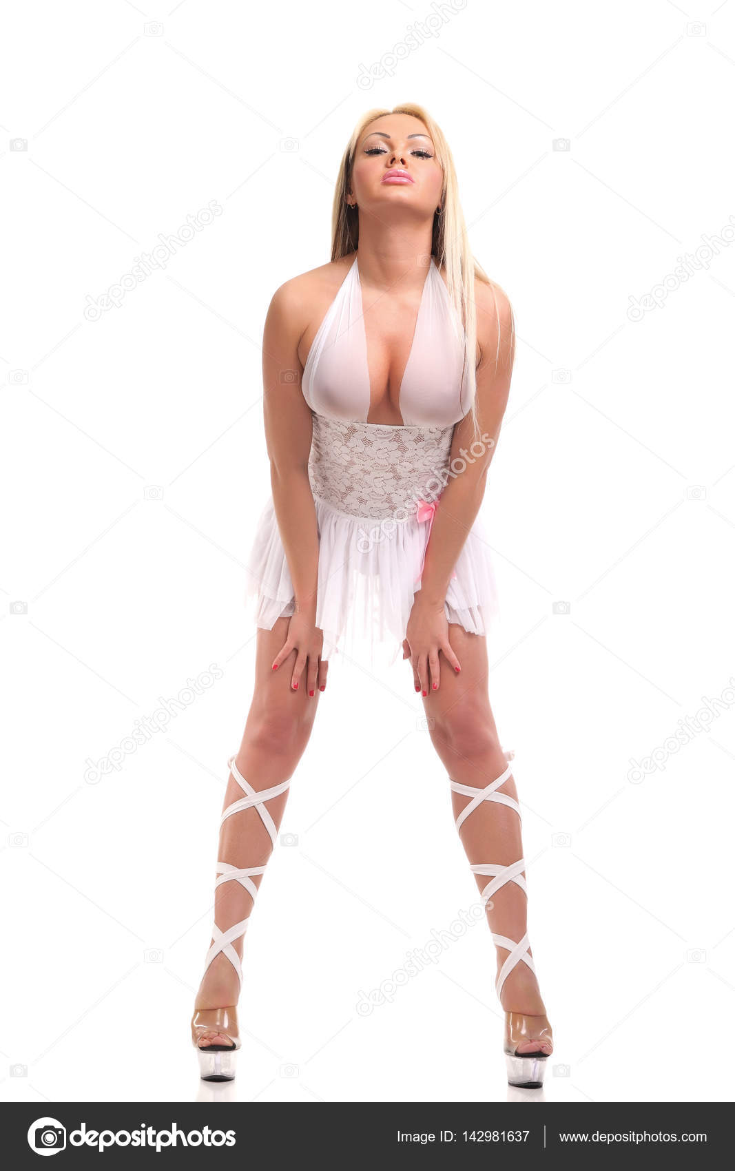 https://st3.depositphotos.com/2970081/14298/i/1600/depositphotos_142981637-stock-photo-stripper-girl-in-a-white.jpg