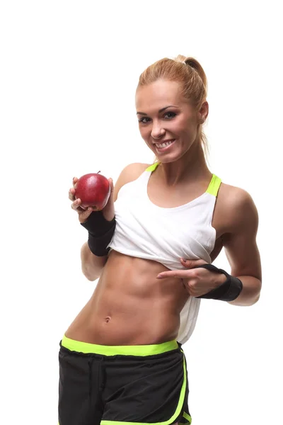 Jonge fitness vrouw gelukkig lachend bedrijf apple — Stockfoto