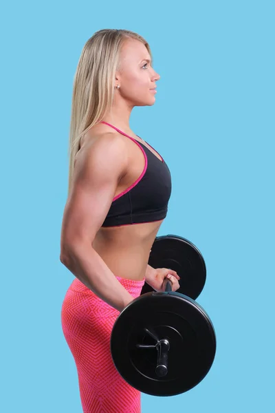 Girl with a barbell — Stock Photo, Image