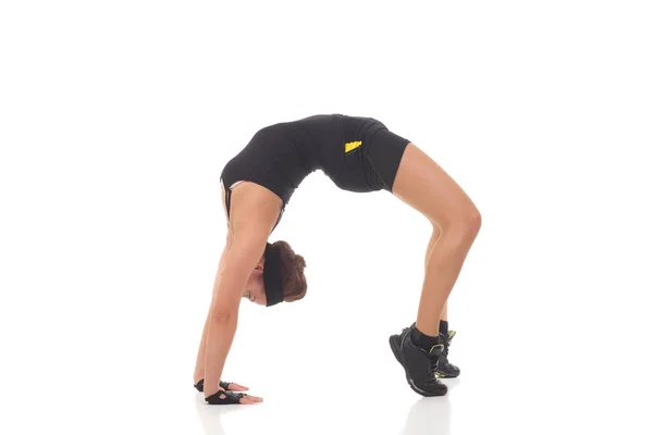 Młody joga kobieta robi ćwiczenia yogatic — Zdjęcie stockowe
