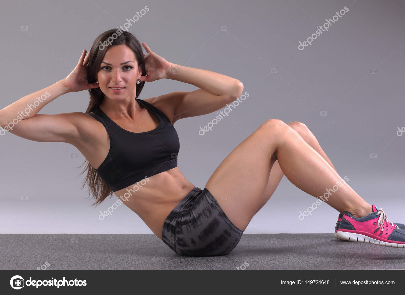 Women Doing Exercise Abdominal Crunches Pumping A Press On Floor