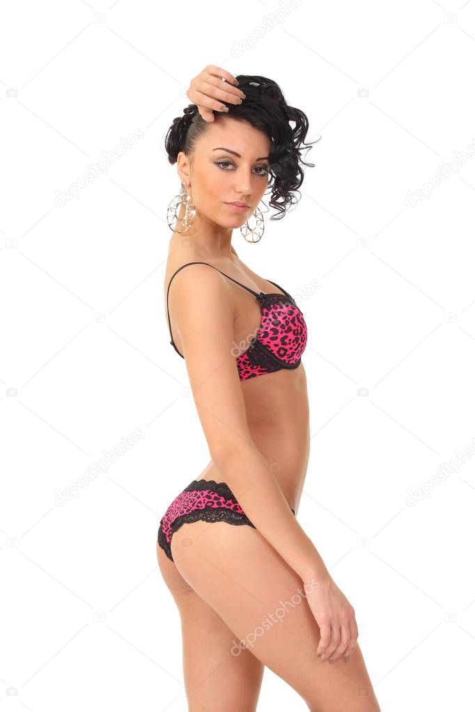 Seductive underwear model posing on white background